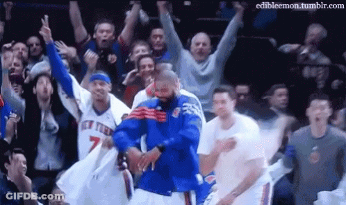Man In Blue Jersey Dancing Before Crowd GIF