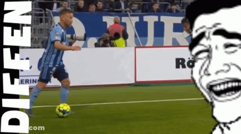 Man In Blue Jersey Kicking Soccer Ball GIF