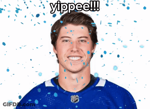 Man In Blue Jersey With Confetti Says Yippee GIF