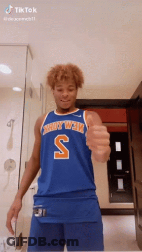 Man In Blue Jersey With Letter S Thumbs Up GIF