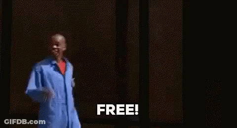 Man In Blue Jumpsuit Saying Free GIF