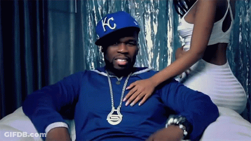 Man In Blue KC Hat Sitting On Couch GIF