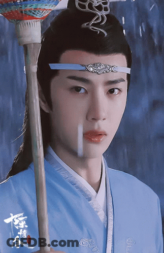 Man In Blue Kimono And Chinese Writing Headband GIF