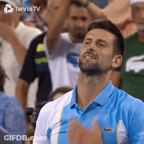 Man In Blue Lacoste Shirt Applauding Before Crowd GIF