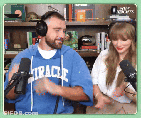 Man In Blue Miracle Sweatshirt At Microphone GIF