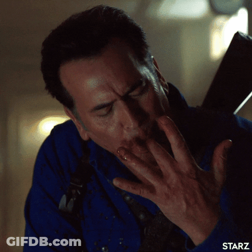 Man In Blue Must've Think His Fingers Taste Like Hotdog GIF