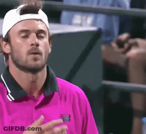Man In Blue New Balance Shirt Waving GIF