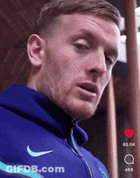 Man In Blue Nike Hoodie Looking At Camera GIF