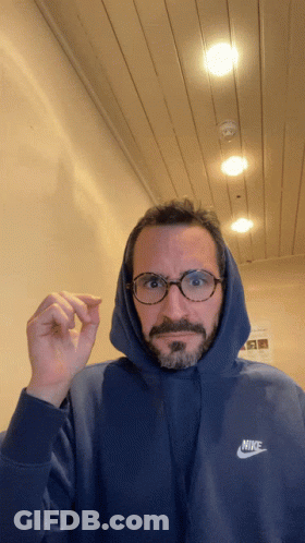 Man In Blue Nike Hoodie Surprised GIF