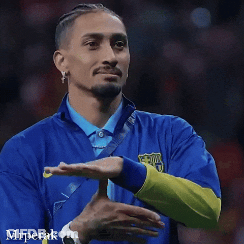 Man In Blue Nike Jacket With FCB Logo GIF