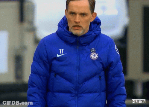 Man In Blue Nike Jacket With Letter T GIF