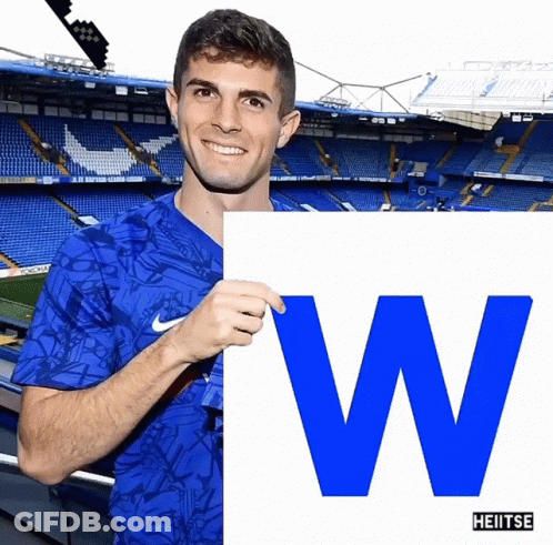 Man In Blue Nike Shirt Holding Sign W GIF