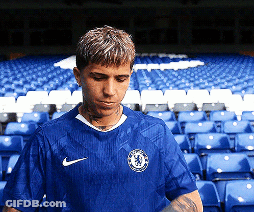 Man In Blue Nike Shirt With Chelsea Logo GIF