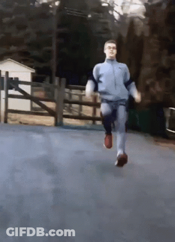 Man In Blue Nike Tracksuit Running GIF