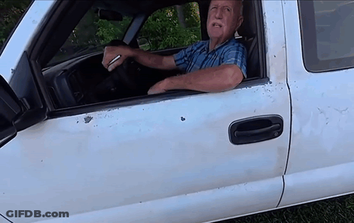 Man In Blue Plaid Shirt White Truck GIF