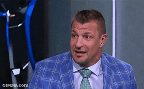 Man In Blue Plaid Suit Making A Face GIF
