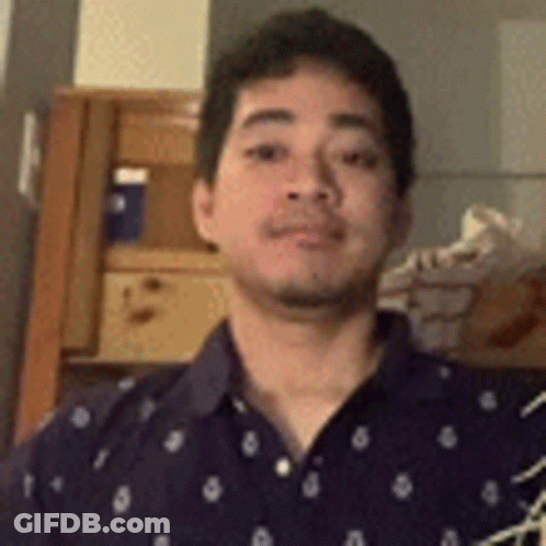 Man In Blue Polka Dot Shirt GIF