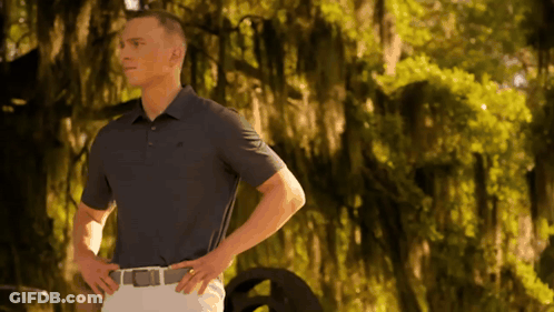 Man In Blue Polo Shirt Hands On Hips GIF