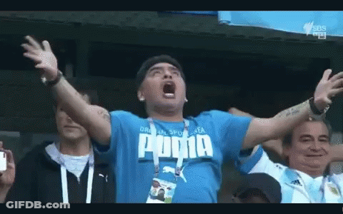Man In Blue Puma Shirt Screaming Arms Outstretched GIF