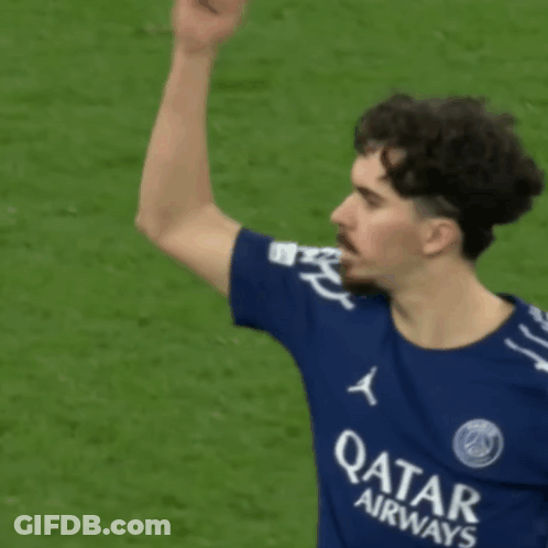 Man In Blue Qatar Airways Shirt Waving GIF