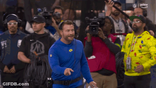 Man In Blue Rams Jersey In Front Of Crowd GIF