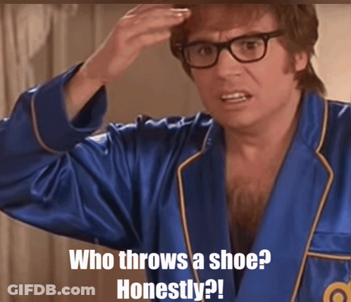 Man In Blue Robe Says Who Throws A Shoe Honestly GIF