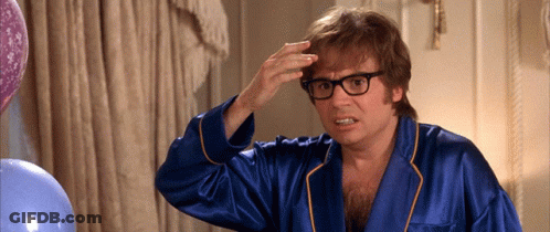 Man In Blue Robe Scratching Head GIF