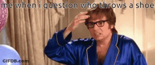 Man In Blue Robe Scratching Head Me When I Question Who Throws A Shoe GIF