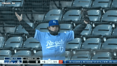 Man In Blue Royals Jersey In Stands GIF