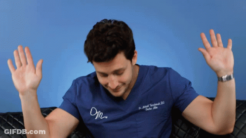Man In Blue Scrub Top Saying Dr. Ariel Weinberg D.D GIF