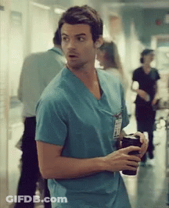 Man In Blue Scrub Top With Name Tag GIF