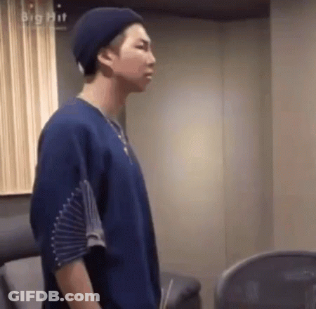 Man In Blue Shirt And Beanie GIF