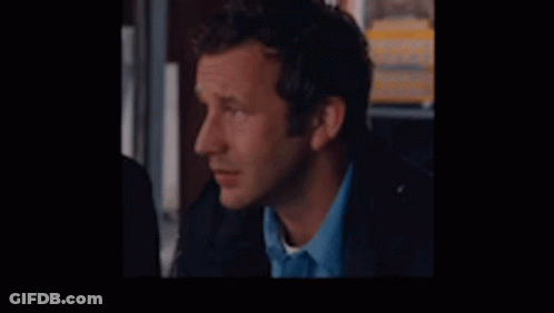 Man In Blue Shirt And Black Jacket GIF