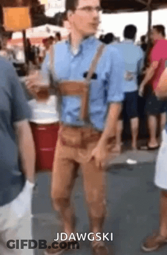 Man In Blue Shirt And Brown Pants With Jdawgski Above Him GIF