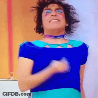 Man In Blue Shirt And Eye Shadow Dancing GIF