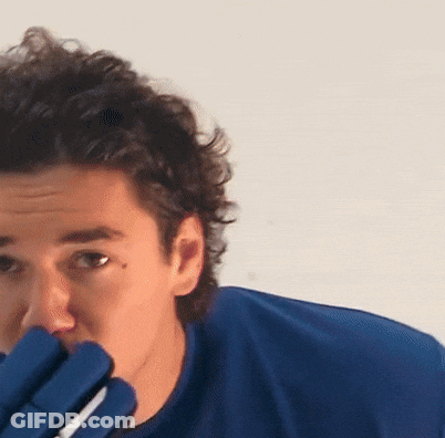 Man In Blue Shirt And Gloves GIF