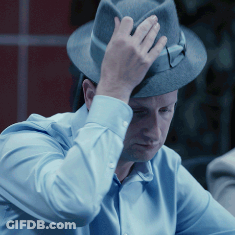 Man In Blue Shirt And Grey Hat GIF