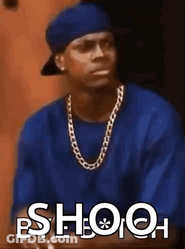 Man In Blue Shirt And Hat Saying Shooh GIF