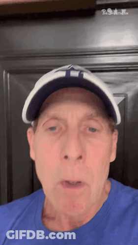 Man In Blue Shirt And Hat With T GIF