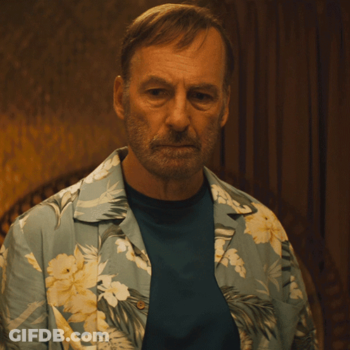 Man In Blue Shirt And Hawaiian Shirt GIF