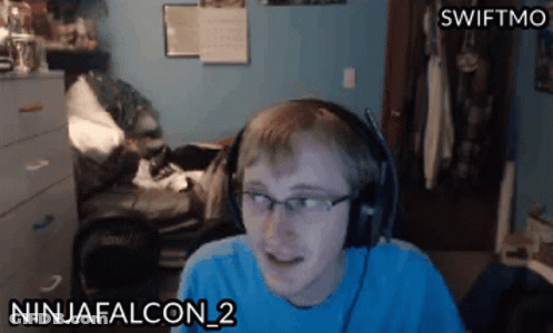 Man In Blue Shirt And Headphones With Ninjafalcon_2 GIF