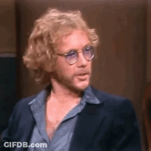 Man In Blue Shirt And Jacket With Glasses GIF