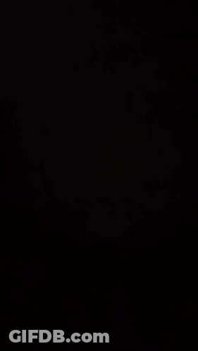 Man In Blue Shirt And Jeans Arms Outstretched Diamond Creations Logo GIF