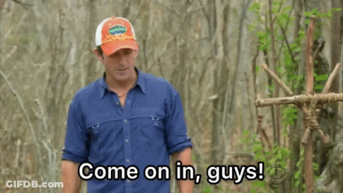 Man In Blue Shirt And Orange Hat Saying Come On In Guys GIF