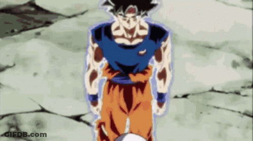 Man In Blue Shirt And Orange Pants On Rocky Ground GIF