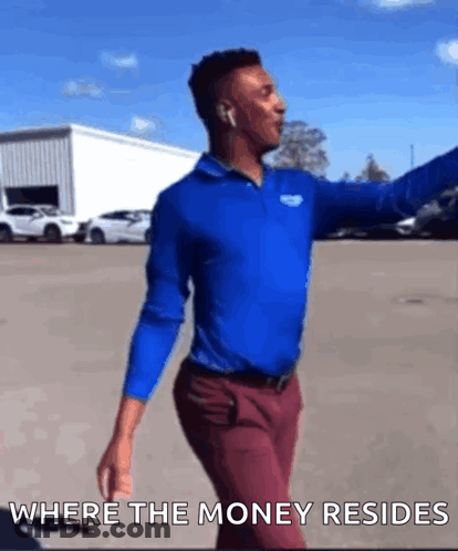 Man In Blue Shirt And Red Pants Dancing Where The Money Resides GIF
