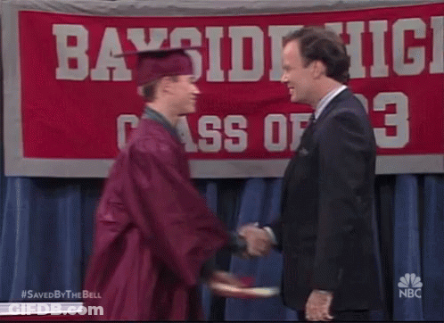 Man In Blue Shirt And Red Tank Top Beside Suited Man GIF