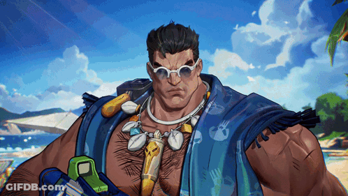 Man In Blue Shirt And Sunglasses On Beach GIF