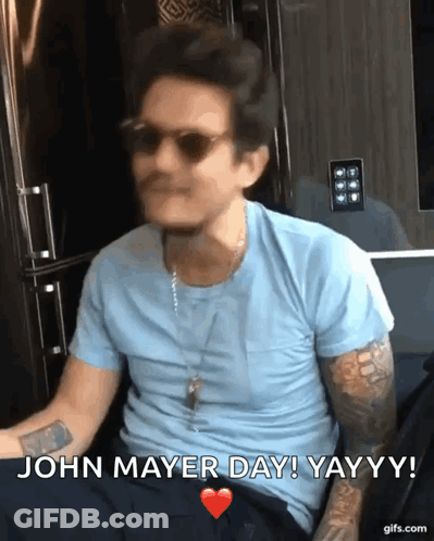 Man In Blue Shirt And Sunglasses Saying John Mayer Day GIF