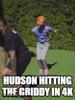 Man In Blue Shirt And Suspenders Jumping GIF